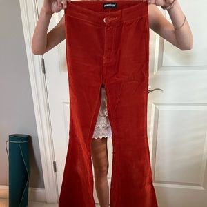 DOLLS KILL BURNT ORANGE CORDUROY JEANS